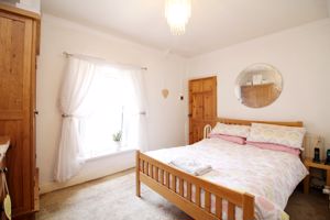 Bedroom One- click for photo gallery